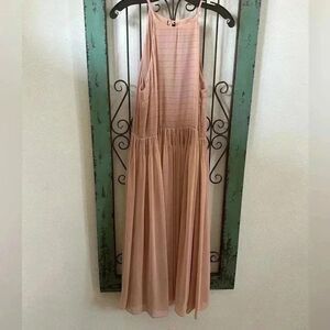 Muted pink dress with open back. This dress is very flattering.